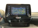 the dashboard of a car with a gps device in the center