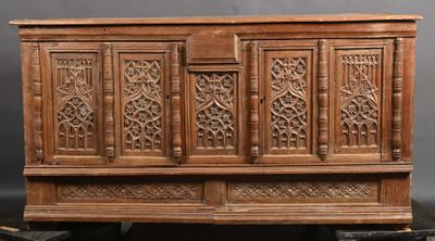 an old wooden chest with carvings and carvings on the doors