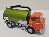 a toy truck that is sitting on a table