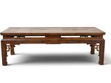 an image of a wooden table with a bench underneath it