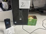 an image of a desktop computer and a cell phone on a desk