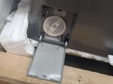 a picture of a metal box with a power outlet in it