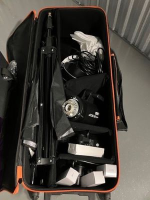 an open suitcase with a bunch of items inside of it