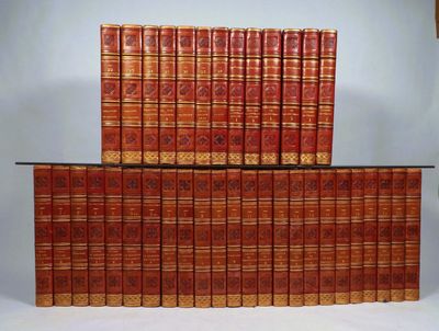 a stack of books sitting on top of each other on a table