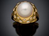 une bague en perles et diamants