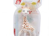 cure-dent en forme de girafe dans son emballage, sur fond blanc