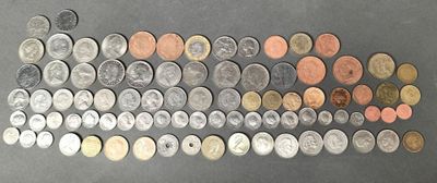 many different types of coins on the table