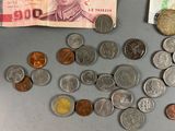 a lot of coins and a note on the table