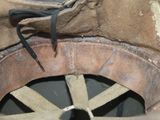 a brown hat with a black ribbon on it