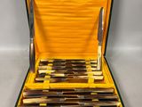 a case with knives and knives in it on a table
