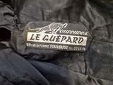 a close up of a black jacket with a label on it