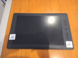 an image of a tablet computer sitting on top of a wooden table