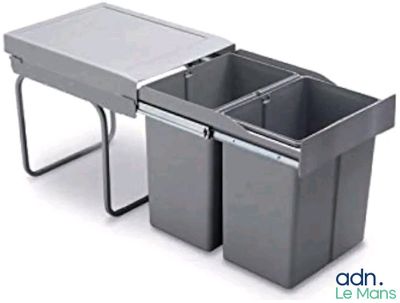 a sink with two bins on it and a table underneath it