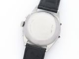 a close up of a watch on a white surface with a black strap