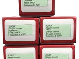 four red boxes of soap sitting on top of each other