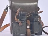 two binoculars that are sitting next to each other