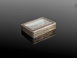 an image of a silver box with a mother of pearl in it