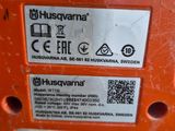 a picture of a close up of the back of a chainsaw