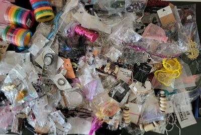 a pile of assorted items sitting on top of a table