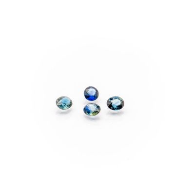 a pair of blue and green gems on a white background