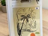 a picture of a picture of a palm tree on top of a magazine
