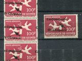 quatre timbres représentant des oiseaux sur un fond noir