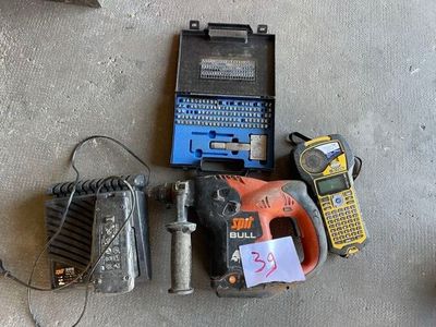 a lot of tools that are laying out on the floor