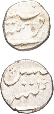deux pièces d'argent ornées de motifs sur un fond blanc