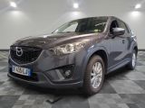 the mazda cx - 5 is parked on a checkered floor