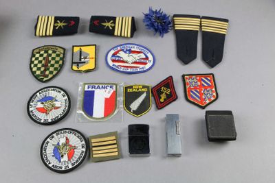 a lot of military patches and patches on a table