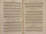 an old book with a page of music written in it