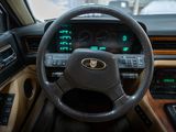 dashboard of a car with a steering wheel and dashboard lights