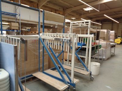 a large room with a lot of shelves and a lot of boxes
