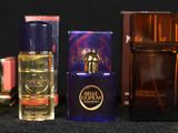 a lot of perfumes that are sitting on a table