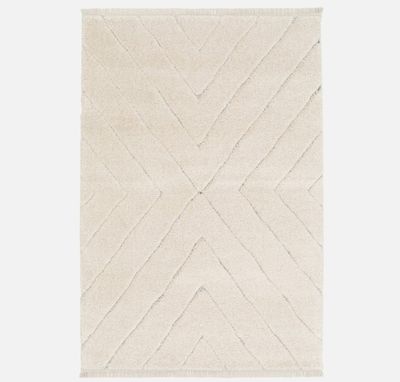 un tapis blanc sur fond blanc