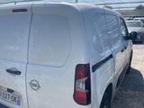 a white van that is parked in a parking lot