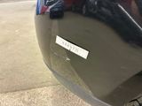 a close up of a car with a sticker on it