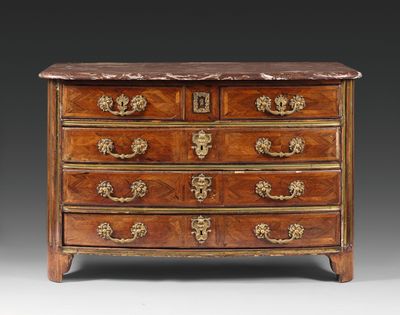 an antique chest of drawers with marble top and brass handles