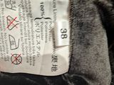 a piece of paper that has been placed on a black jacket