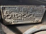 a close up of a metal sign on the side of a truck