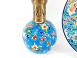 two vases that are sitting next to each other on a table