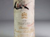 a bottle of wine that is sitting on a table