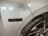 a close up of a car with a sticker on it