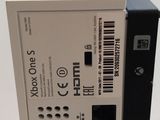 a close up of the back of a power supply unit on a white surface