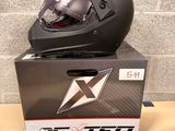 an image of a black helmet sitting on top of a box