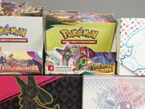 many different types of pokemon cards in the box