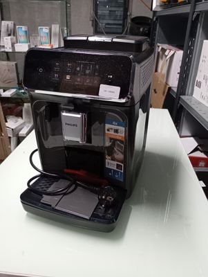 a coffee machine sitting on a table in a room