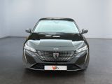 the front view of a grey car in a white room