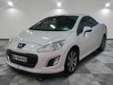a picture of a white car on a checkered floor