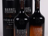 three bottles of barrell strength cogna and a canister of cogna